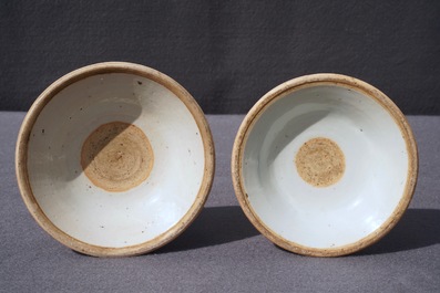 A pair of Chinese blue and white candlesticks, Kangxi/Qianlong